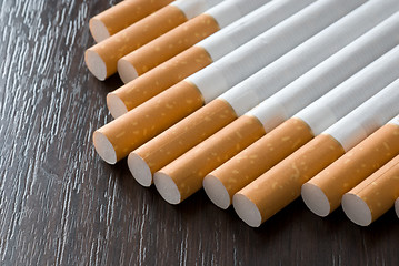 Image showing Cigarettes on the black table