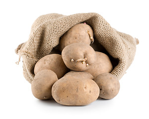 Image showing Raw potatoes in a hessian sack isolated