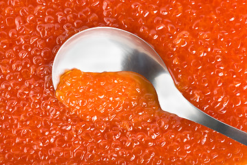 Image showing Spoon into red caviar