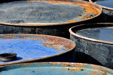 Image showing rusty barrels macro