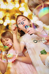 Image showing holiday portrait of happy children against bright background