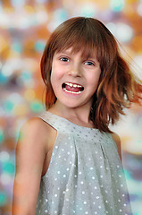 Image showing holiday portrait of happy child against bright background