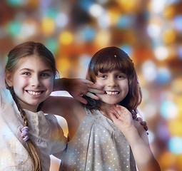 Image showing holiday portrait of happy children against bright background