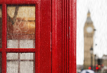 Image showing Big ben and red phone cabine. Rainy day