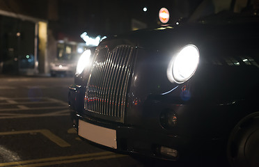 Image showing Taxi in London in front of a shopping center