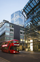 Image showing Red Bus in motion in City of London