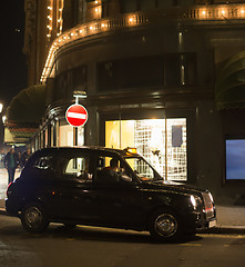 Image showing Taxi in London in front of a shopping center