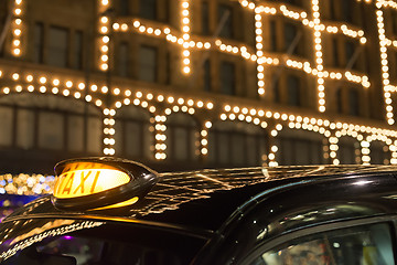 Image showing Taxi in London in front of a shopping center