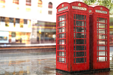 Image showing Rainy day.Red Phone cabines in London