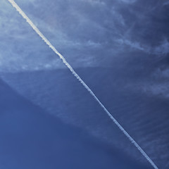 Image showing smoke trail on cloudy sky