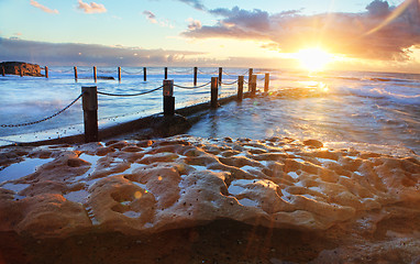 Image showing Starburst Sunrise at Mahon Rock Pool Australia