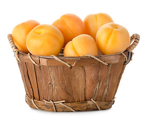 Image showing Raw apricots in a basket