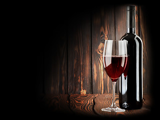 Image showing Red wine with a wineglass