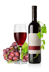 Image showing Bottle of red wine and grape