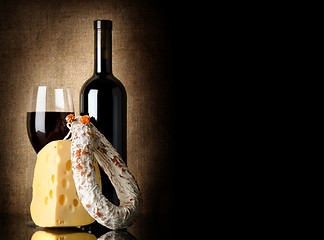 Image showing Wine, cheese and salami