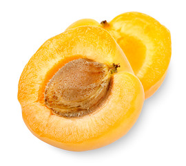 Image showing Ripe apricot sectioned by knife
