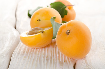 Image showing Apricots on a white table