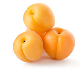 Image showing Four apricots