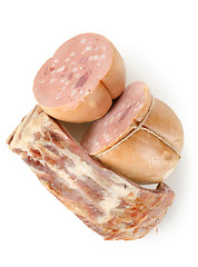 Image showing Cooked sausages and fat
