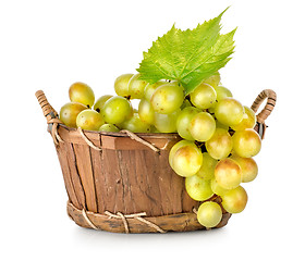 Image showing Grapes in a wooden basket isolated