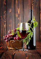 Image showing Bottle of wine and grapes