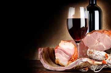 Image showing Wineglass and meat