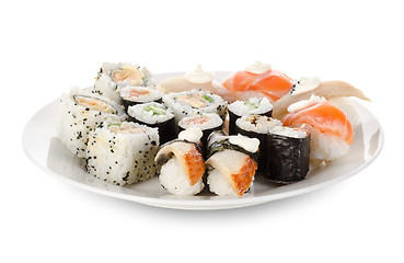 Image showing Sushi and rolls in a dishes