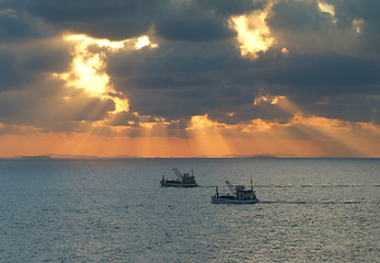 Image showing Fishing boats at sunrise