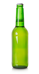 Image showing Beer in a green bottle isolated