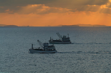 Image showing Fishing boats at sunrise