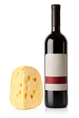 Image showing Wine bottle and dutch cheese