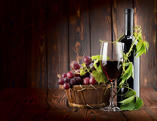 Image showing Wine set on wooden background