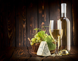 Image showing White wine and blue cheese