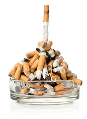 Image showing Cigarettes in a glass ashtray