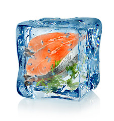 Image showing Ice cube and fish with parsley