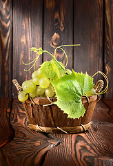 Image showing Grapes on a wooden background