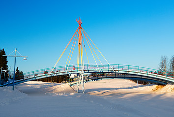 Image showing small bridge on the background of a winter landscape