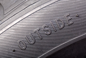 Image showing inscription on the wheel close-up 
