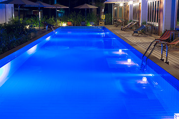 Image showing pretty swimming pool in night at a local resort