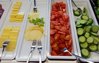 Image showing vegetables and cheese on the trays