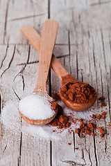 Image showing sugar and cocoa powder in spoons 