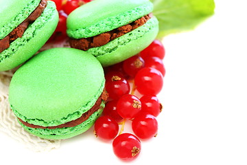 Image showing Macarons stuffed with chocolate and mint.