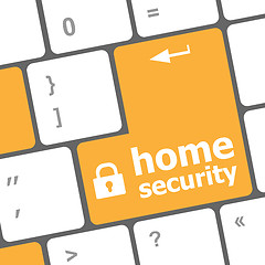 Image showing Safety concept: computer keyboard with Home security icon on enter button background