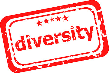 Image showing diversity on red rubber stamp over a white background