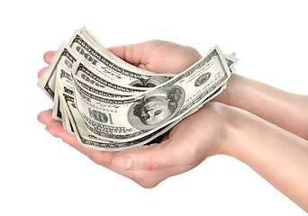 Image showing Hand holds hundreds of dollars