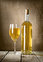 Image showing Dessert wine and glass on the canvas