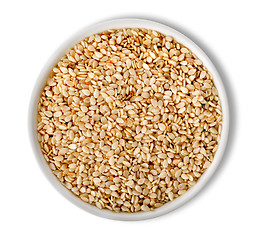 Image showing White sesame in plate isolated