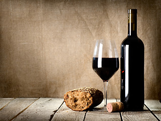 Image showing Wine and  bread on the table