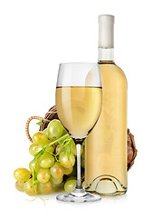 Image showing White wine bottle and grapes in basket