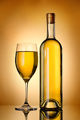 Image showing Bottle over gold background